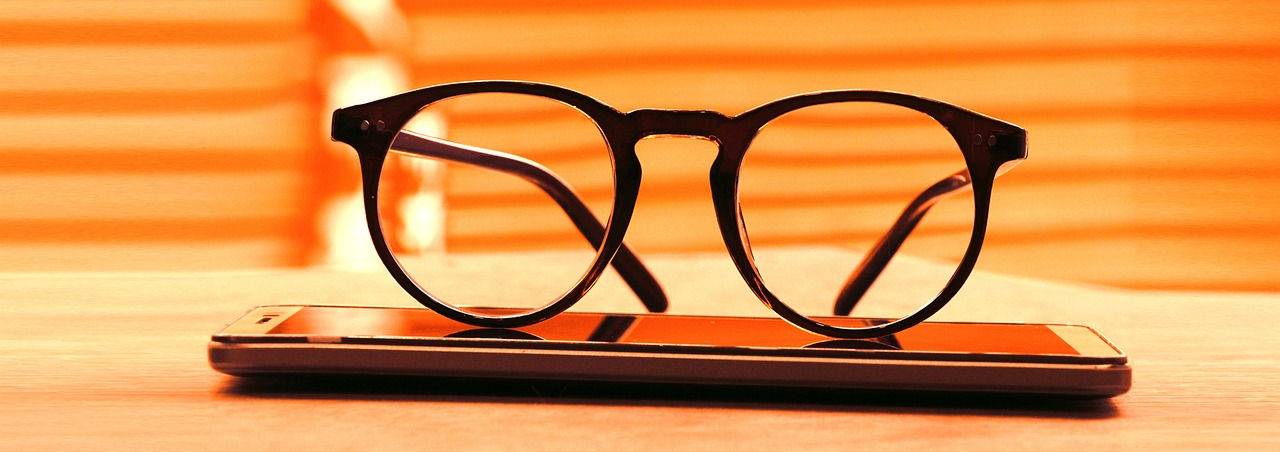 A pair of orange blue light glasses